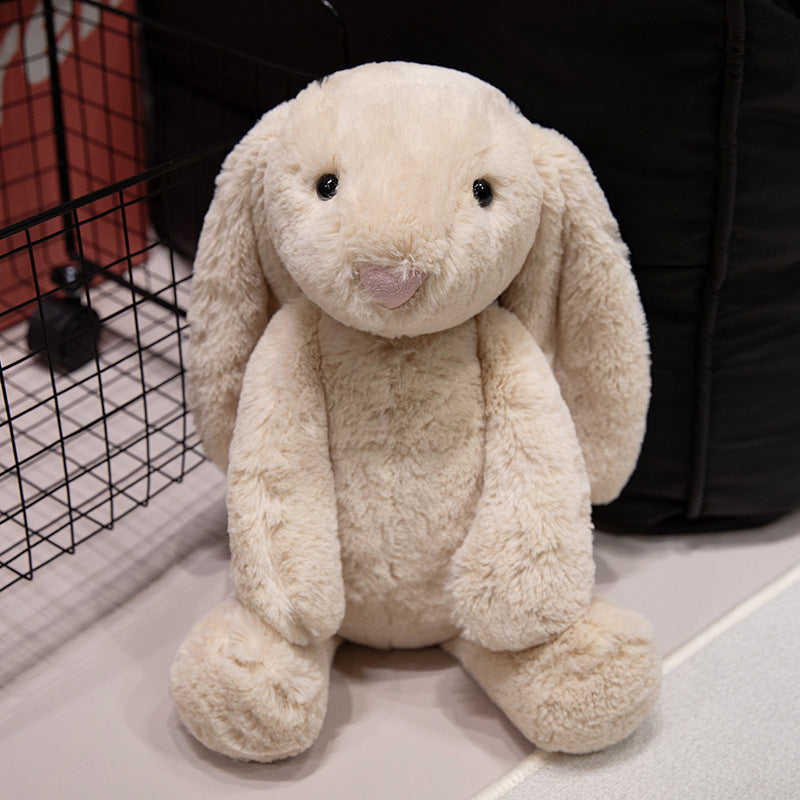 Bashful beige bunny plush toy sitting, adorable chubby stuffed rabbit home decor